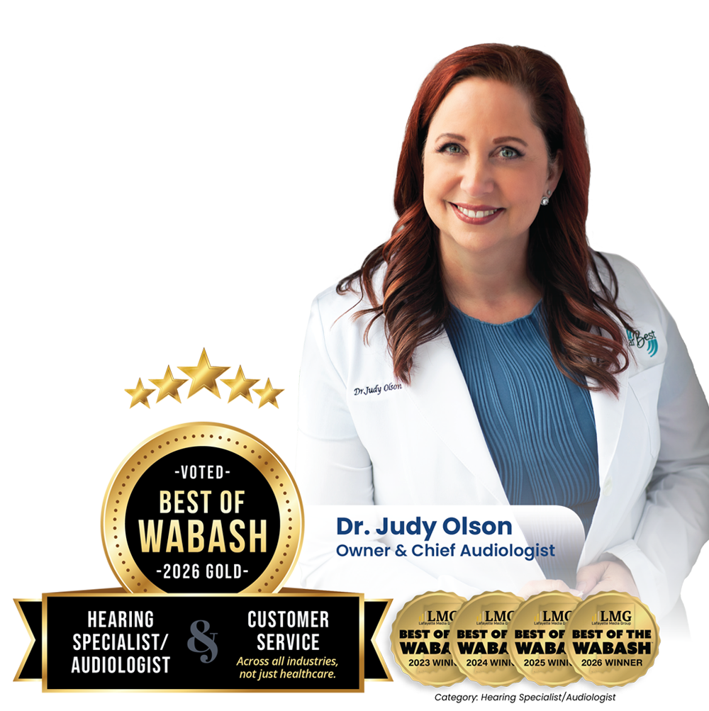 Dr. Judy Olson, AuD, founder of HearBest, holding the 2026 Best of the Wabash Gold awards for Hearing Specialist/Audiologist and Customer Service