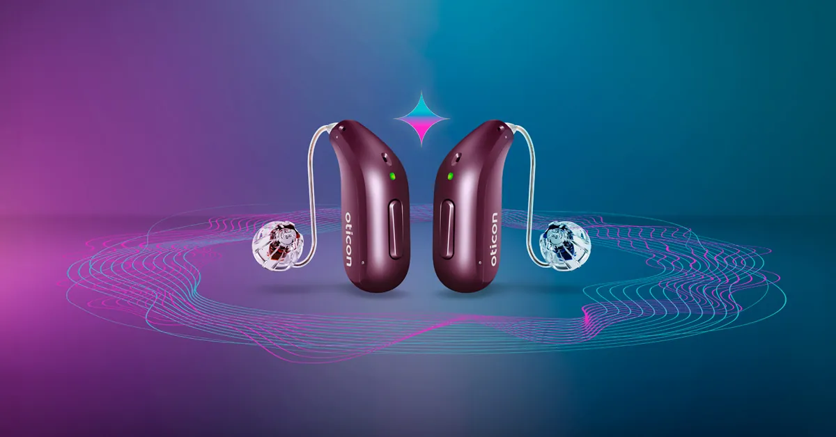 A pair of Oticon Reveal miniRITE hearing aids