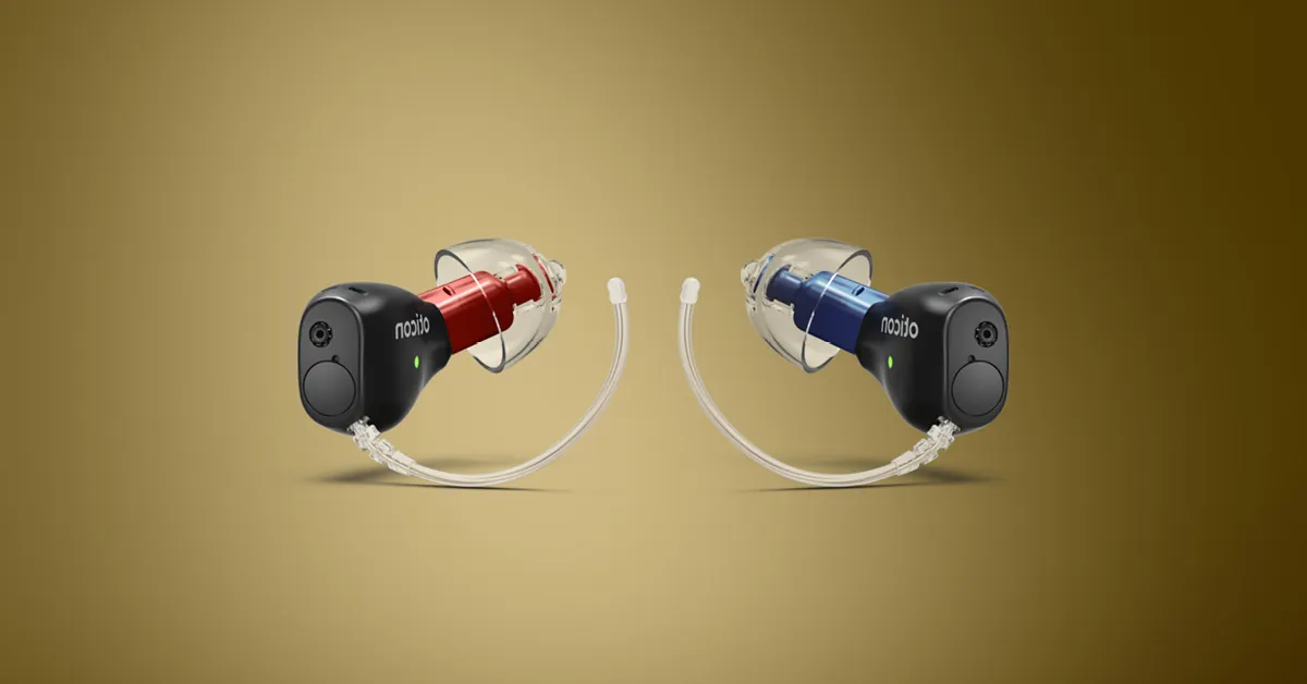 A pair of Oticon Zeal in-the-ear hearing aids