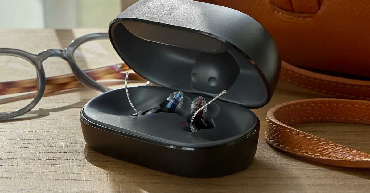 Oticon Zeal hearing aids in their portable SmartCharger